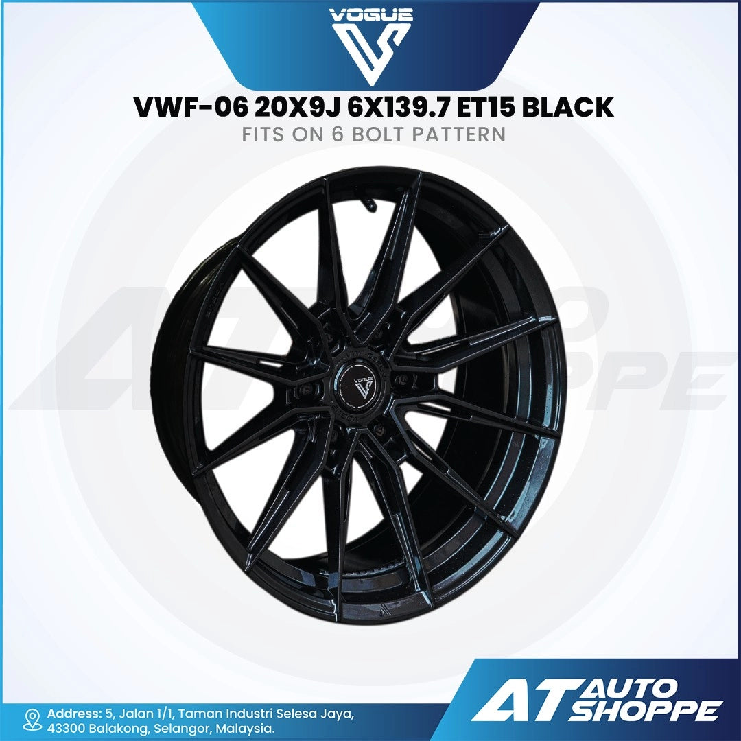 Vogue black alloy wheel with specifications on a white background, featuring AT Auto Shoppe branding.