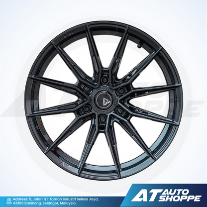 Vogue black alloy wheel on a white background with AT Auto Shoppe branding.