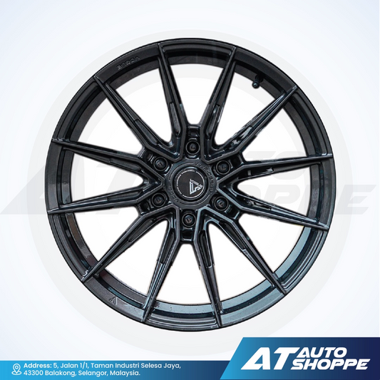 Vogue black alloy wheel on a white background with AT Auto Shoppe branding.