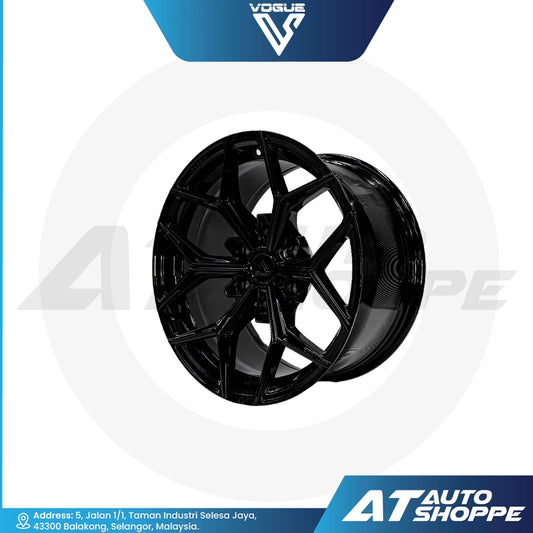 Vogue alloy wheel on a white background with AT Auto Shoppe branding.