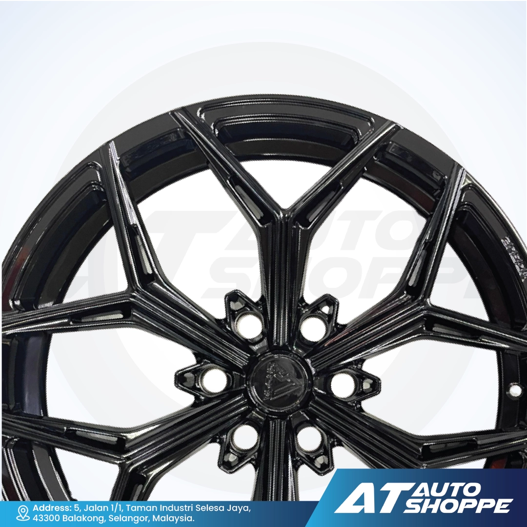 Vogue black alloy wheel with a white background and AT Auto Shoppe branding.