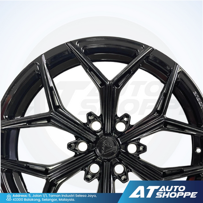 Vogue black alloy wheel with a white background and AT Auto Shoppe branding.