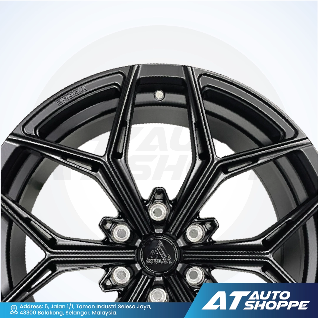 Vogue black alloy wheel with visible branding on a white background