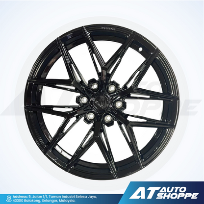 Vogue black alloy wheel on a white background with AT Auto Shoppe branding.