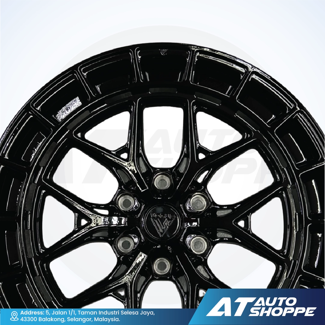 Vogue black alloy wheel with visible branding on a white background