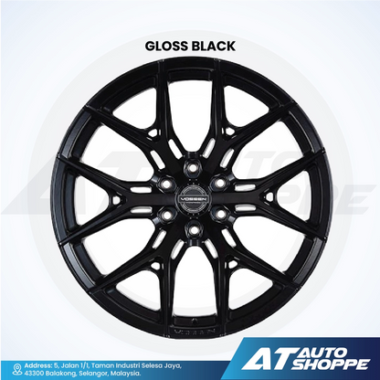 Gloss black alloy wheel on a white background with AT Auto Shoppe branding.