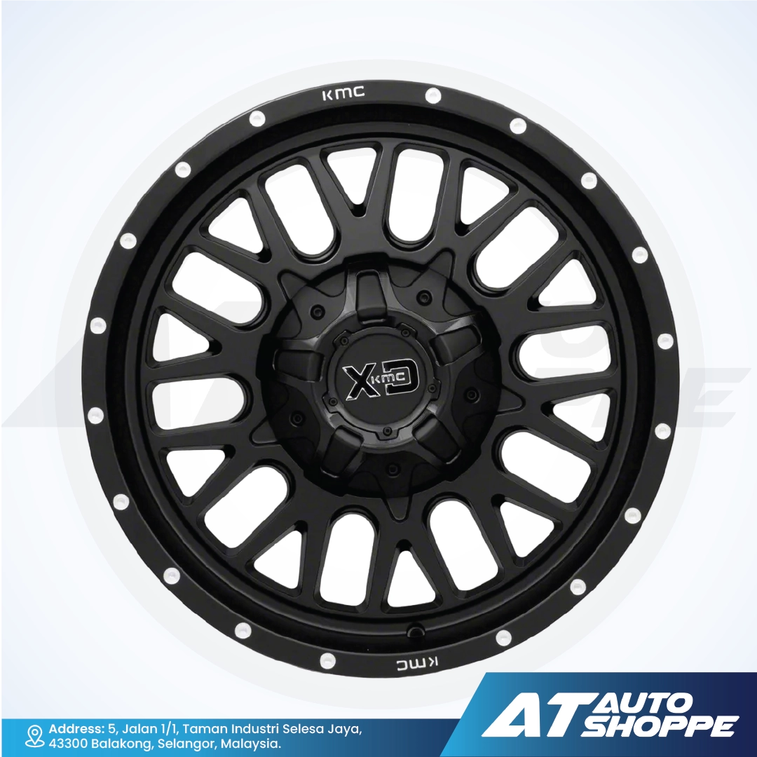 Black alloy wheel with KMC and XD logos on a white background, featuring AT Auto Shoppe branding.