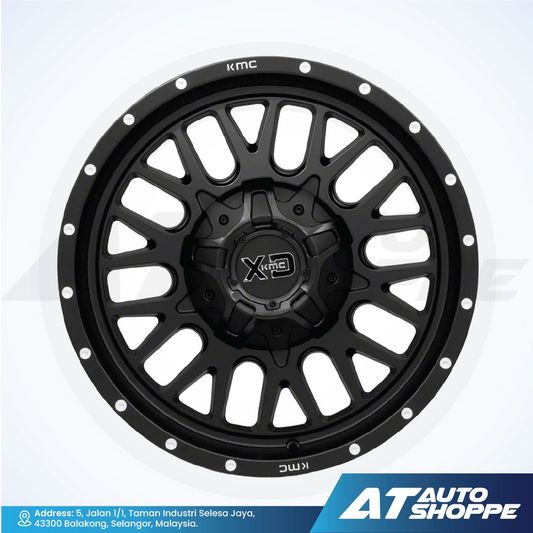 Black alloy wheel with KMC and XD logos on a white background, featuring AT Auto Shoppe branding.